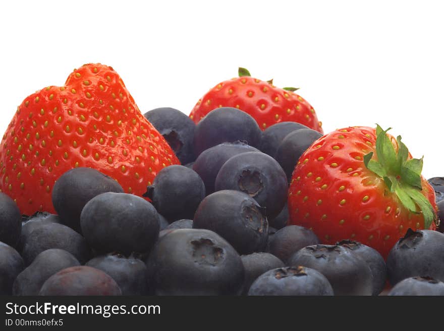 Strawberry and bilberry on white background