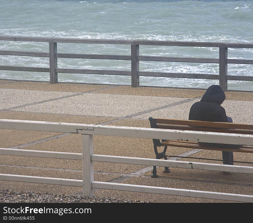 Sitting alone along the coast of France  time for reflection. Sitting alone along the coast of France  time for reflection