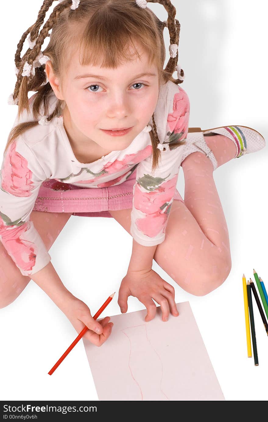 The girl draws on a white background