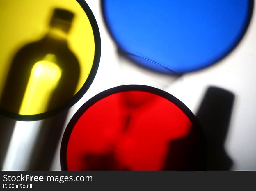 A photo of shaker and glass with colorful colors. A photo of shaker and glass with colorful colors