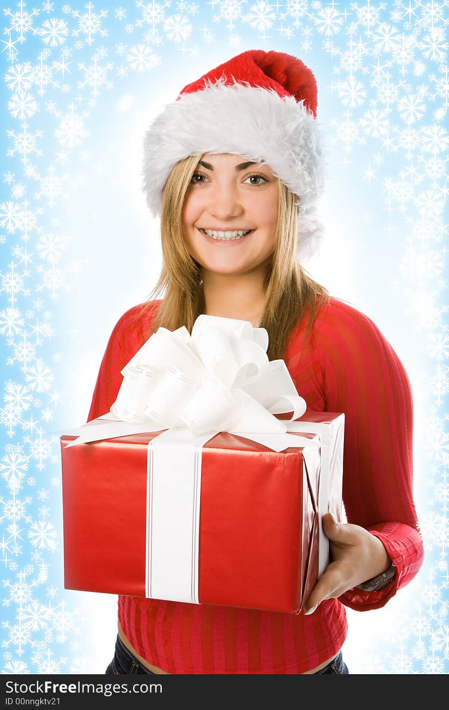 Christmas girl in red hat with box gift