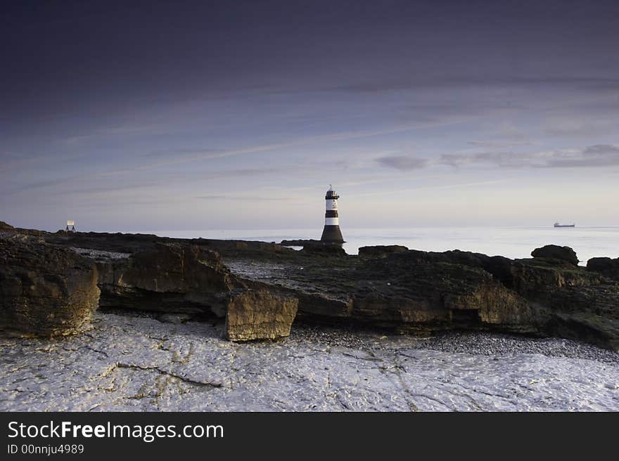 A lighthouse of the coast of Wales, UK.