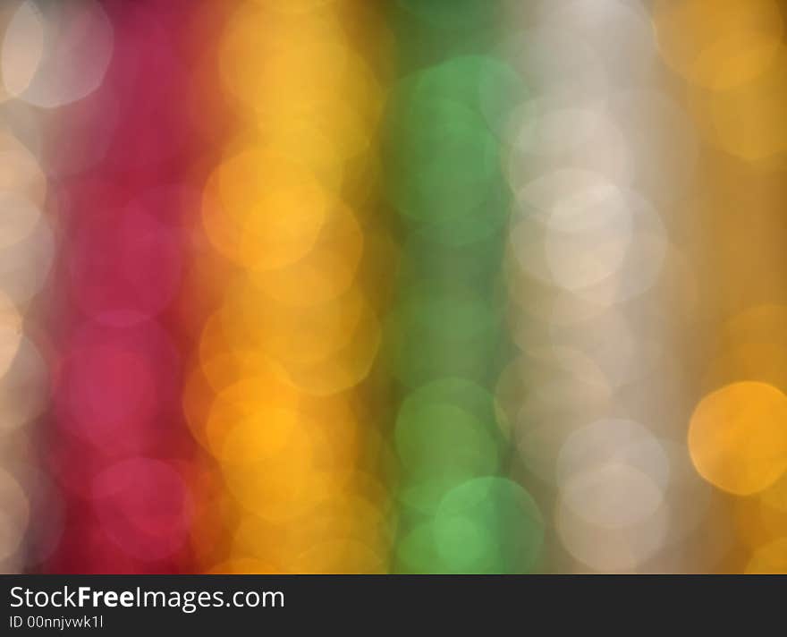 A bright defocused light pattern in rainbow colors. A bright defocused light pattern in rainbow colors