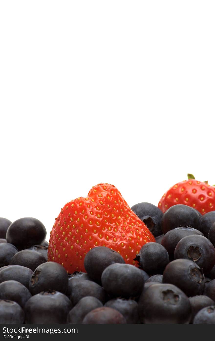 Bilberry and strawberry on white background