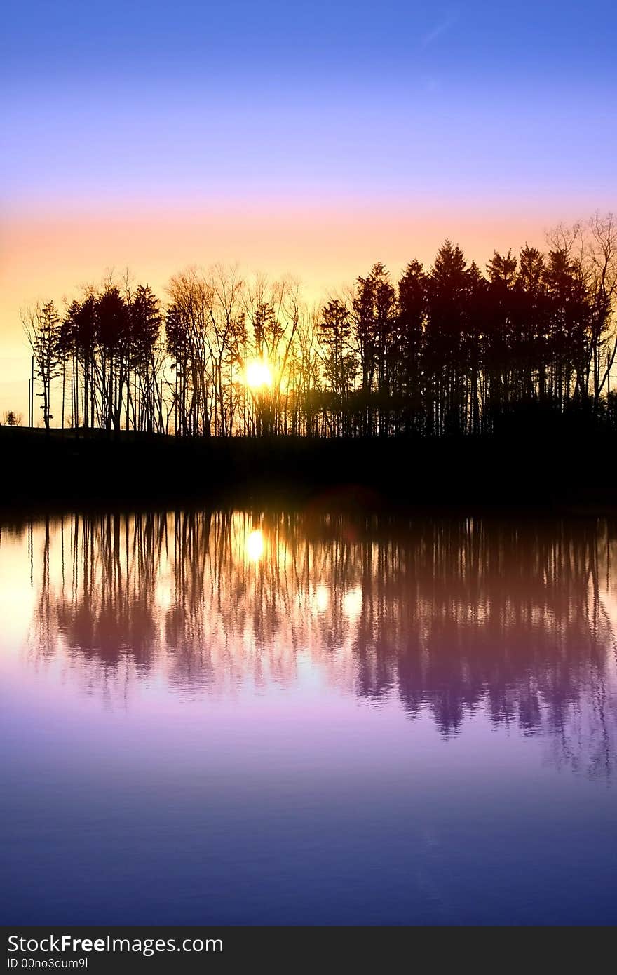 Sun set and colorful skies reflection on to lake. Sun set and colorful skies reflection on to lake