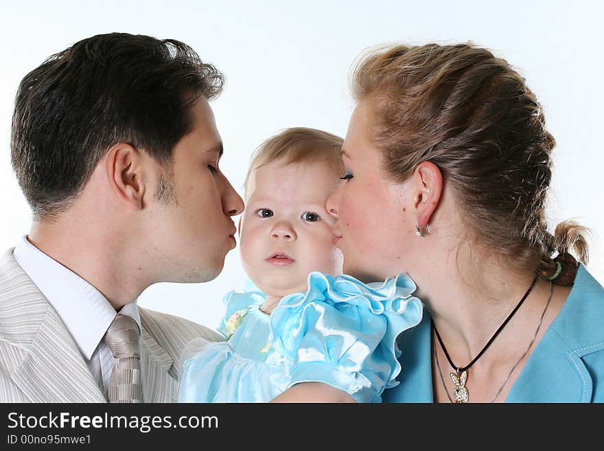 Young happy family on a white background. Young happy family on a white background