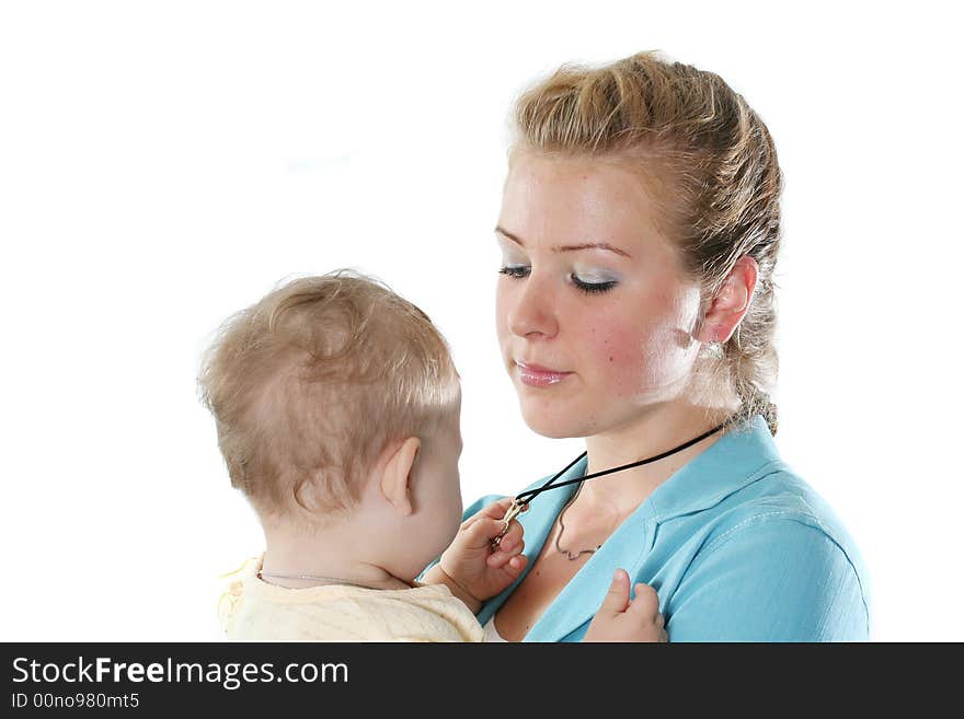 Young mum with a daughter gently look against each other. Young mum with a daughter gently look against each other