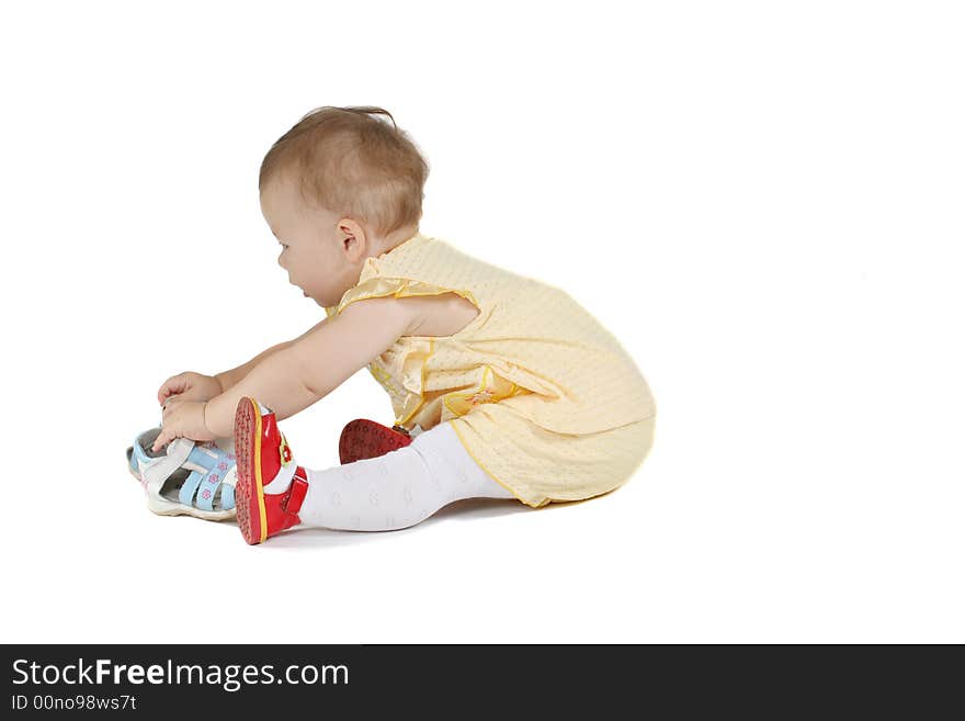 The beautiful little girl isolated on a white background. The beautiful little girl isolated on a white background