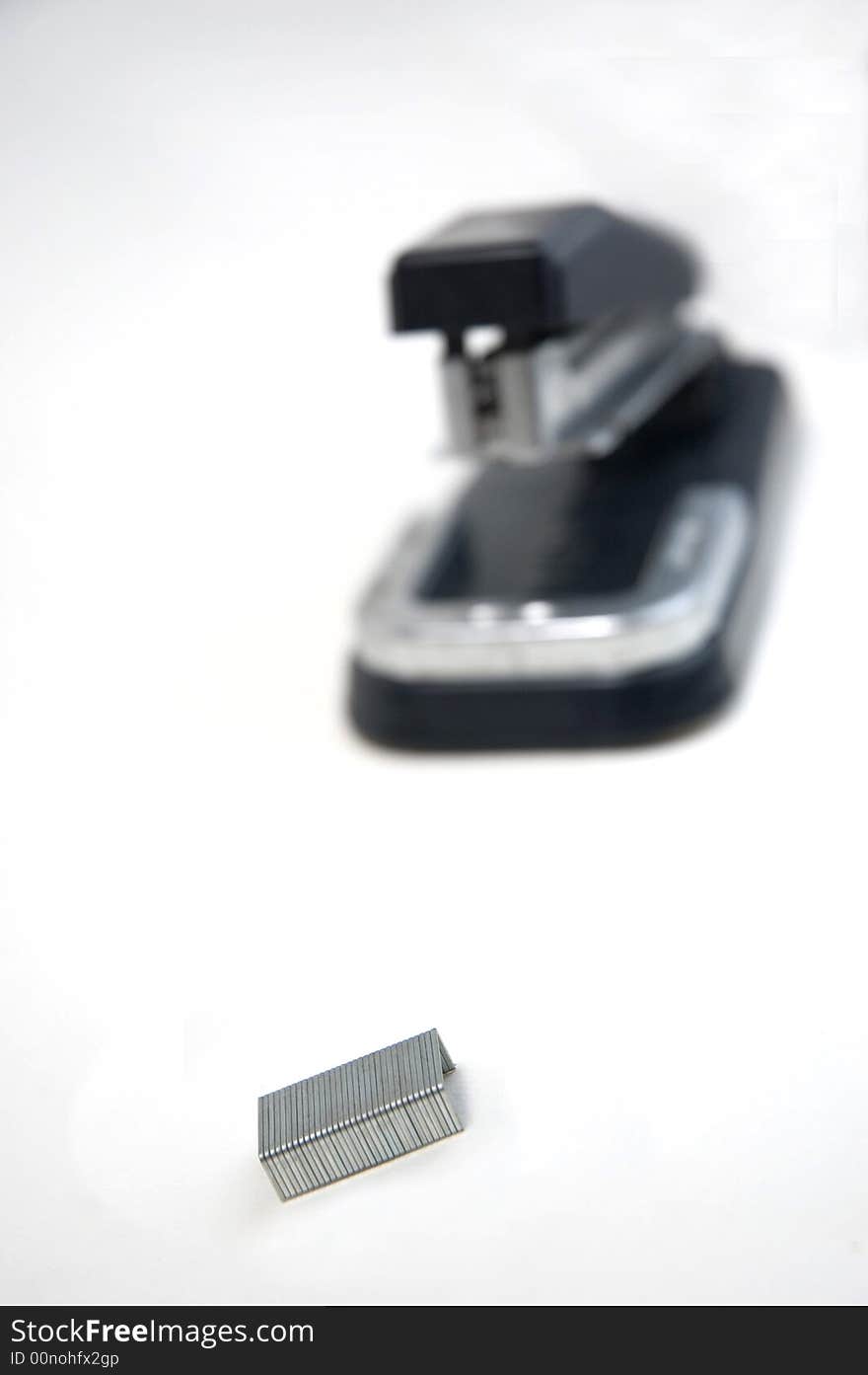 Black Stapler On White Background.