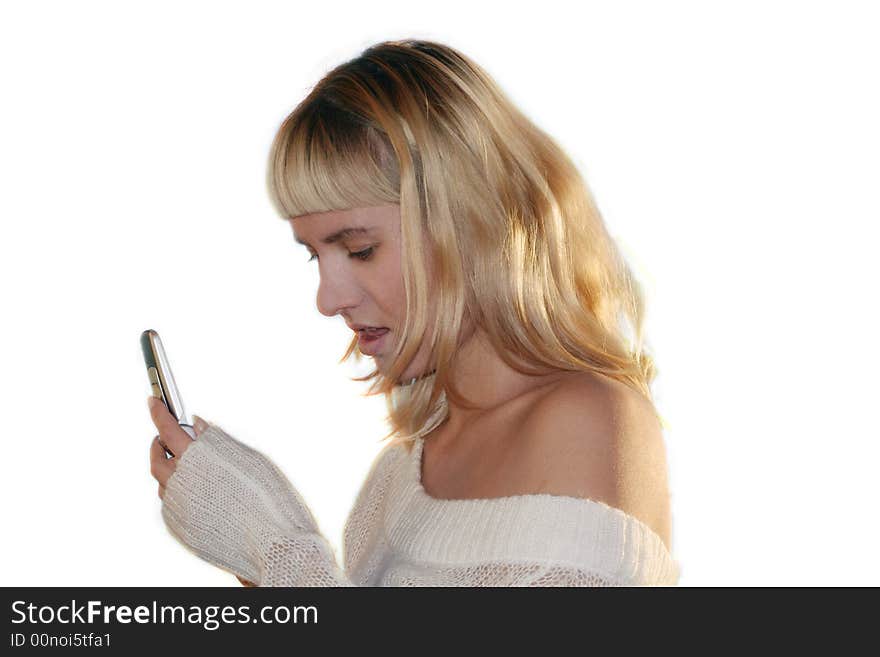 Young blond woman sms by mobile pho