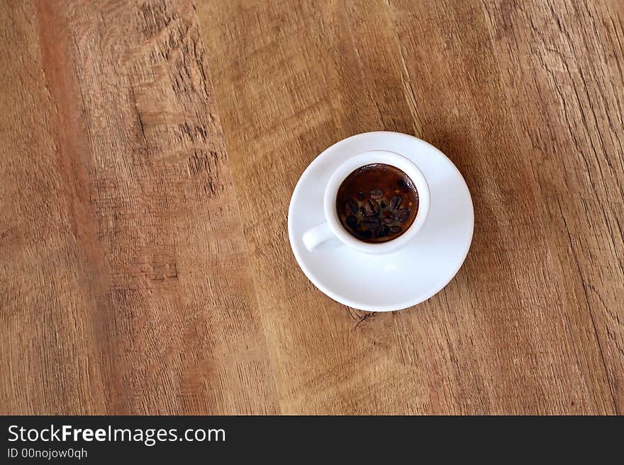 A Cup On Wood