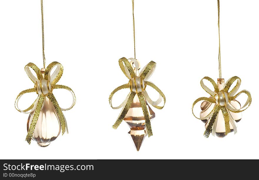 3 glass Christmas decorations over white background