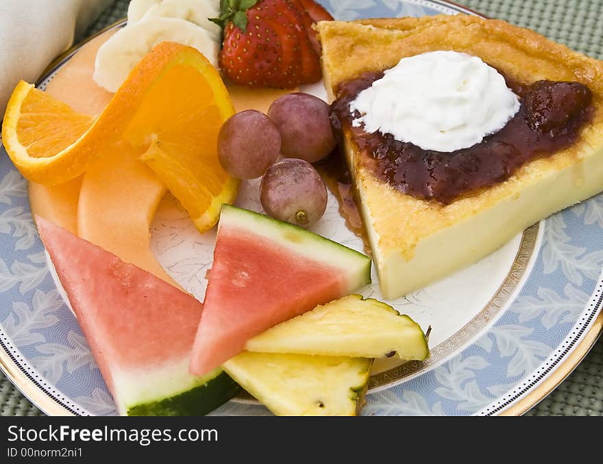 A wonderful healthy breakfast lots of fresh fruit on a nice plate