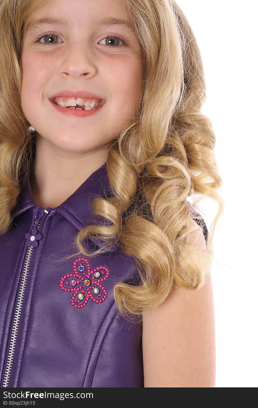 Photo of a little blonde curls headshot