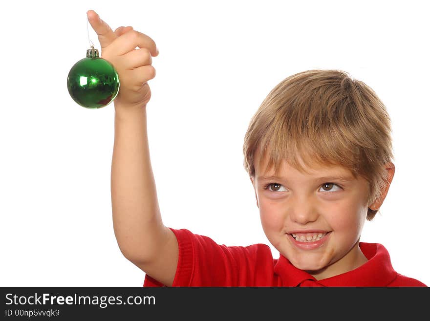 Photo of a cute child holding christmas ornament