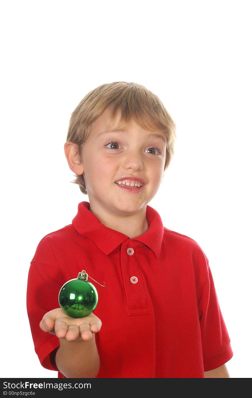 Photo of a child holding ornament vertical