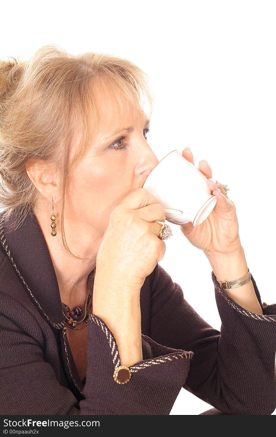 Woman sipping tea fine china