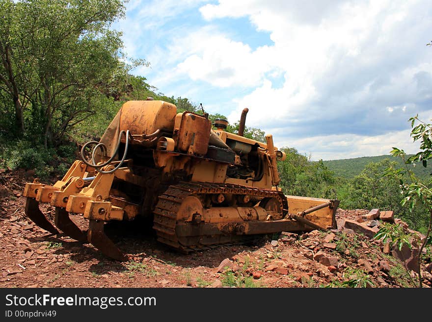 A crawler dozer on a hill