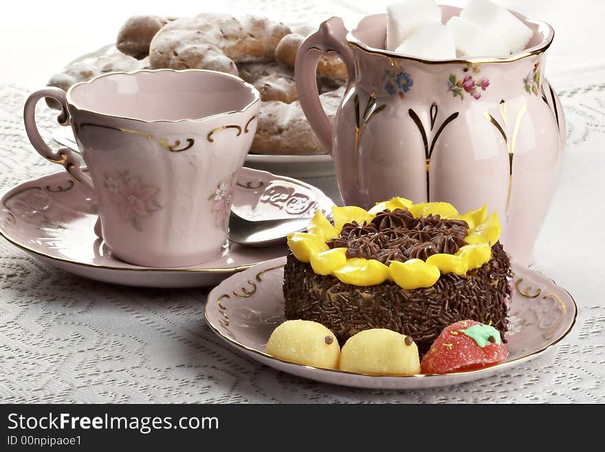 Breakfast with cake and tea on the table