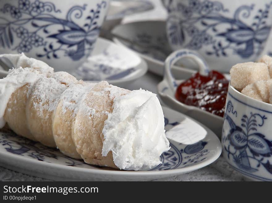 Breakfast with cake and tea on the table