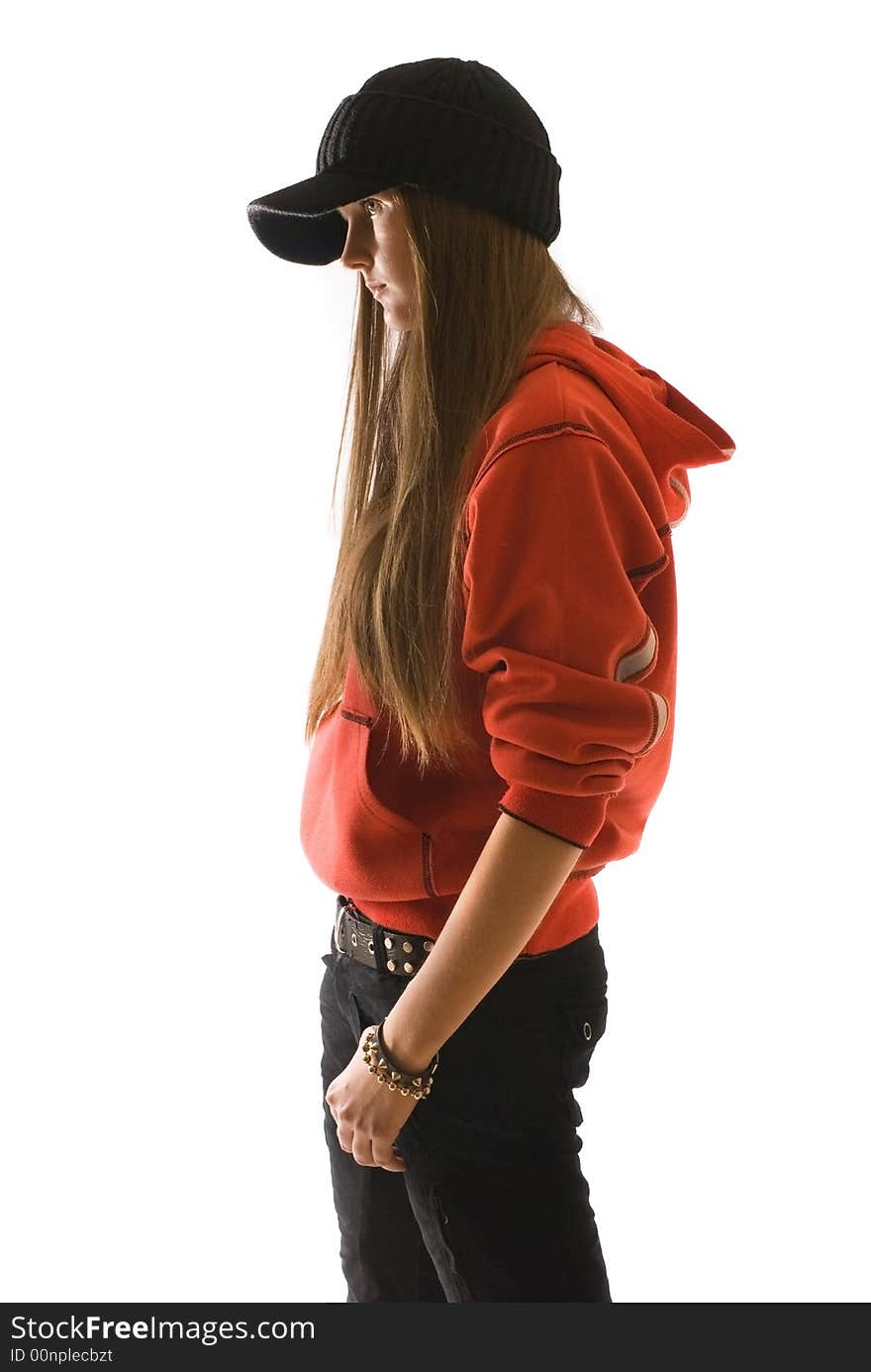 Things, a young girl in red, black cap, stands side,. Things, a young girl in red, black cap, stands side,