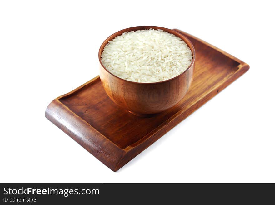 Bowl of rice on wooden tray