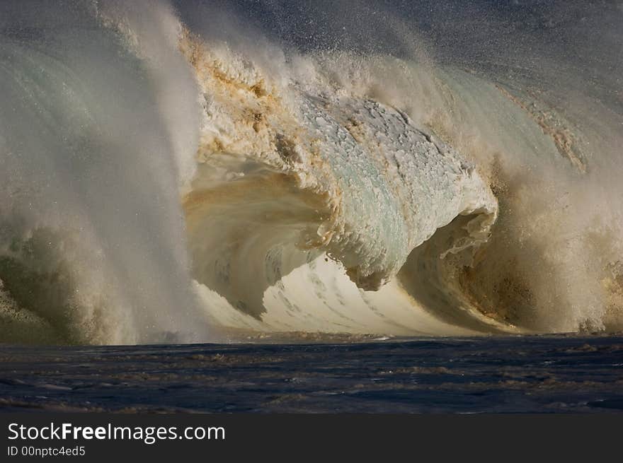 Giant wave breaking on the north shore of oahu. Giant wave breaking on the north shore of oahu