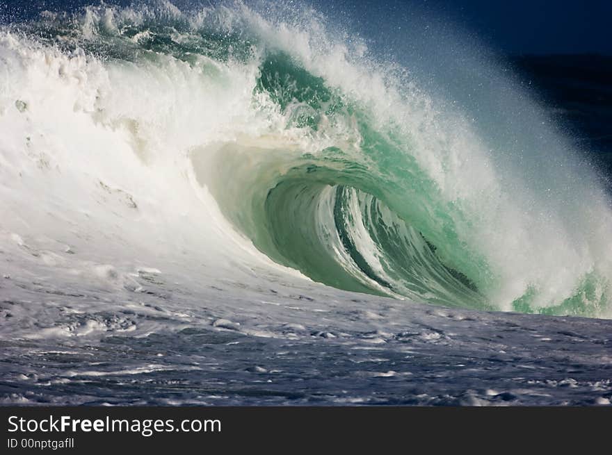 Giant wave breaking on the north shore of oahu. Giant wave breaking on the north shore of oahu