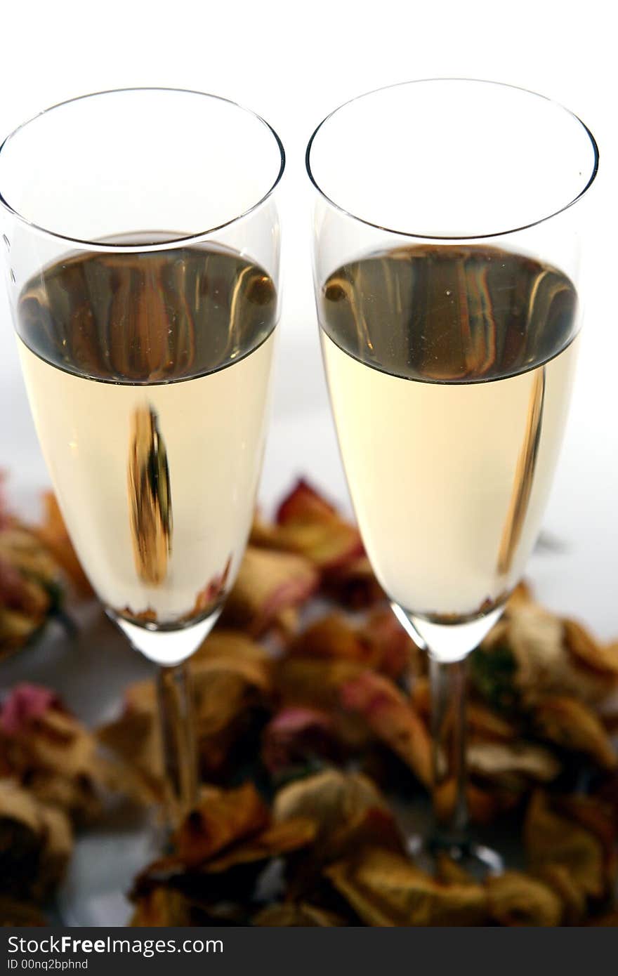 Wineglass of champagne isolated in white background