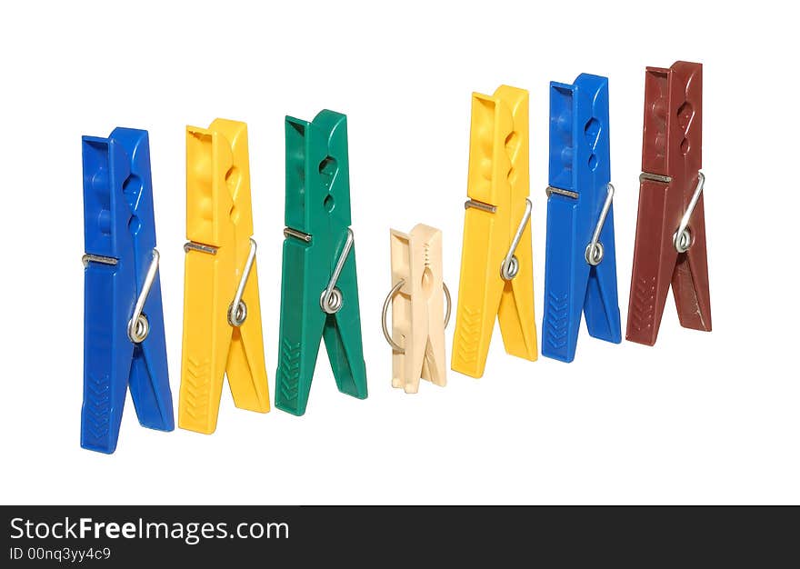 Colorful clothes pegs isolated over a white background