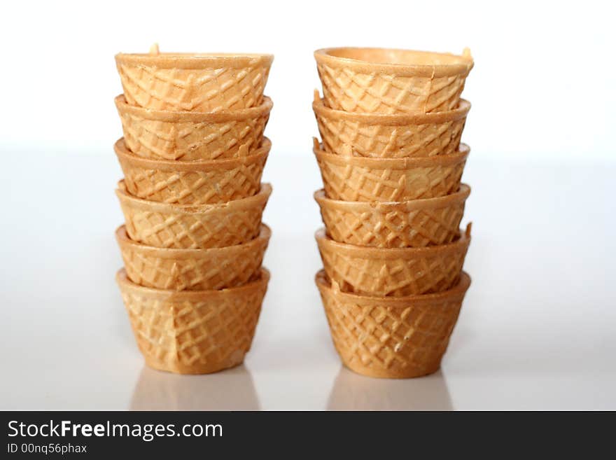 Small glasses of crispy wafer for drinking alcohol / Two small columns