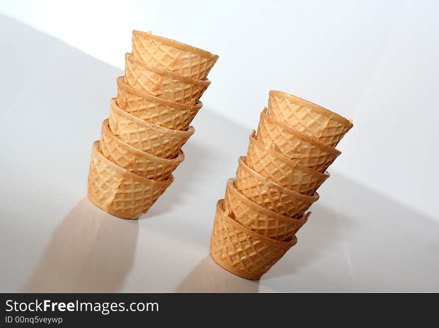 Small glasses of crispy wafer for drinking alcohol / Two small columns