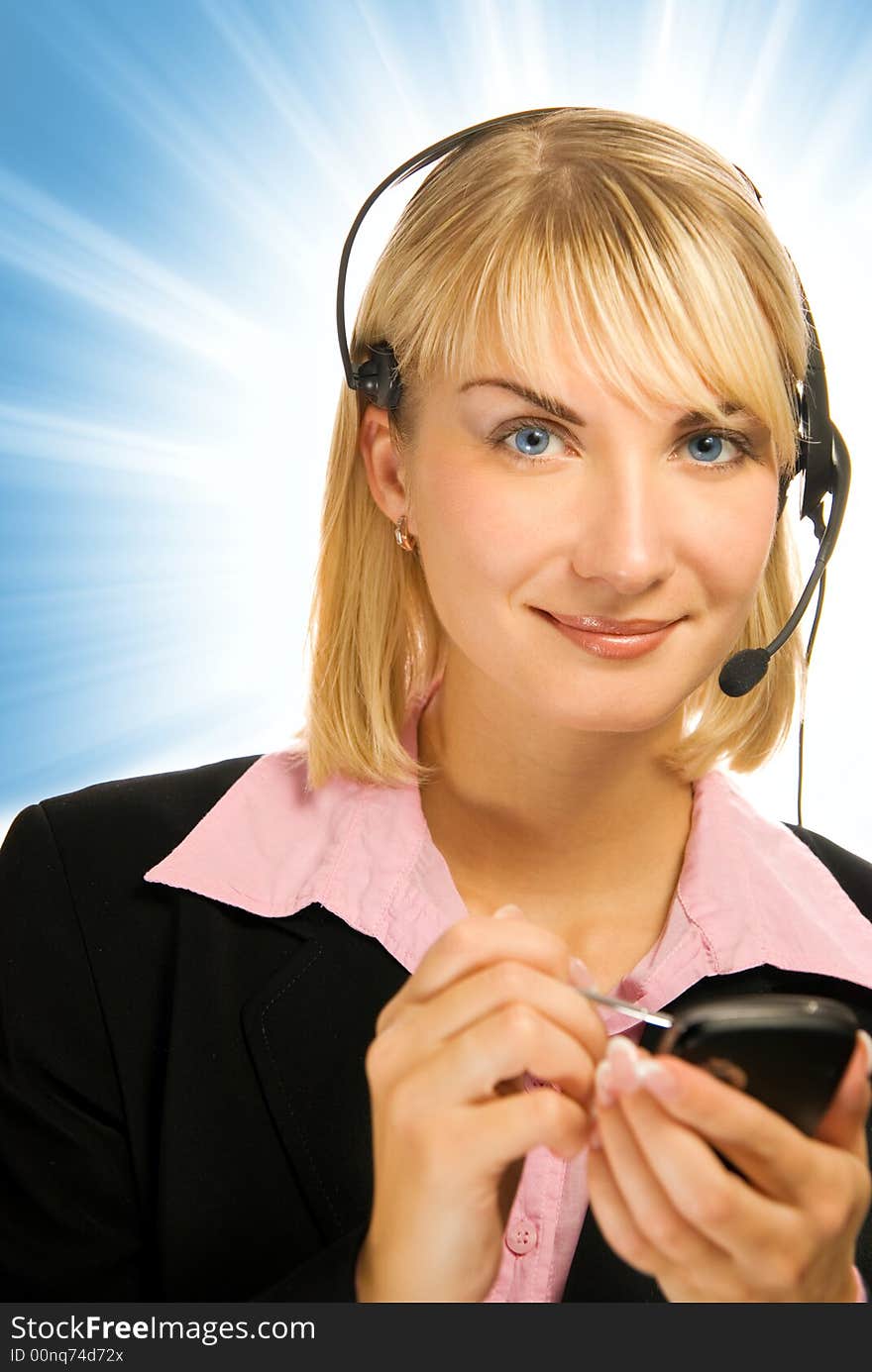 Beautiful hotline operator with cellphone in her hands on abstract background