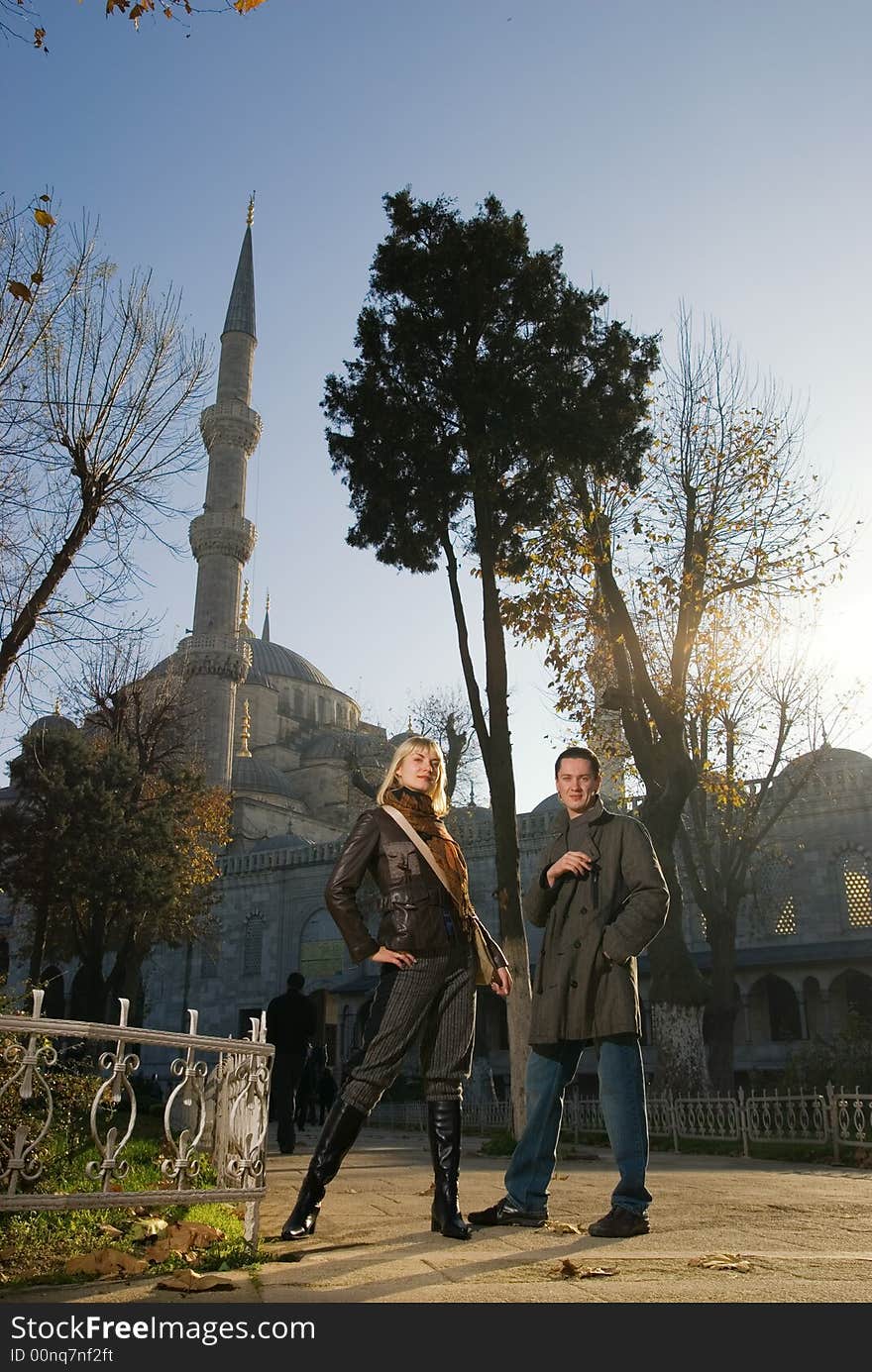 Attractive caucasian couple in front of famous Blue Mosque (Istanbul, Turkey). Attractive caucasian couple in front of famous Blue Mosque (Istanbul, Turkey)