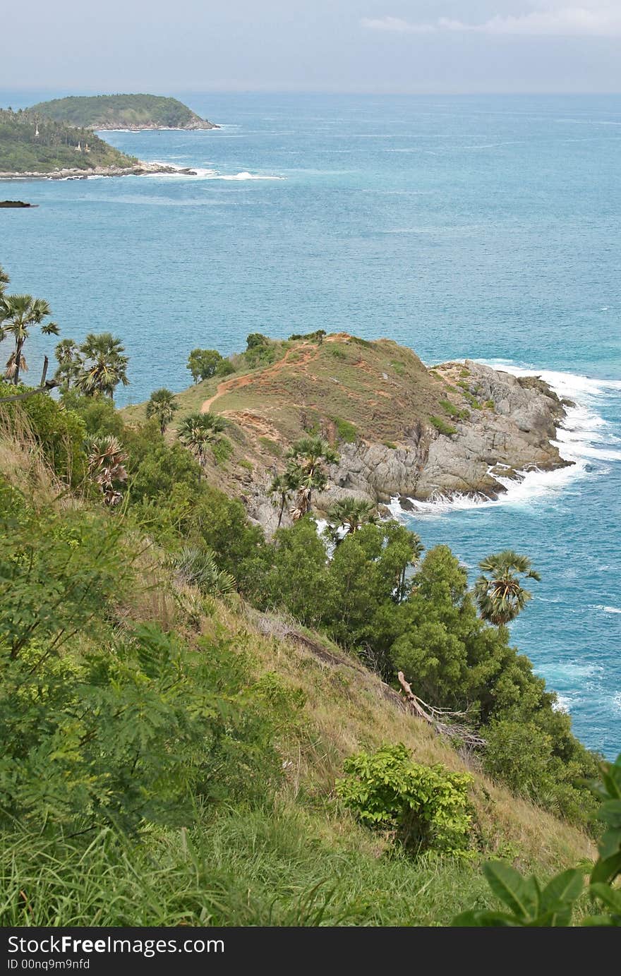 Phrom Thep Cape is a dramatic headland on the island of Phuket in Thailand. Phrom Thep Cape is a dramatic headland on the island of Phuket in Thailand