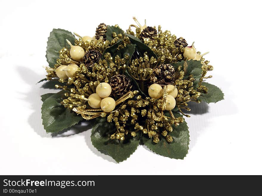 A beautiful simple green and red chaplet christmas decoration islolated on white background