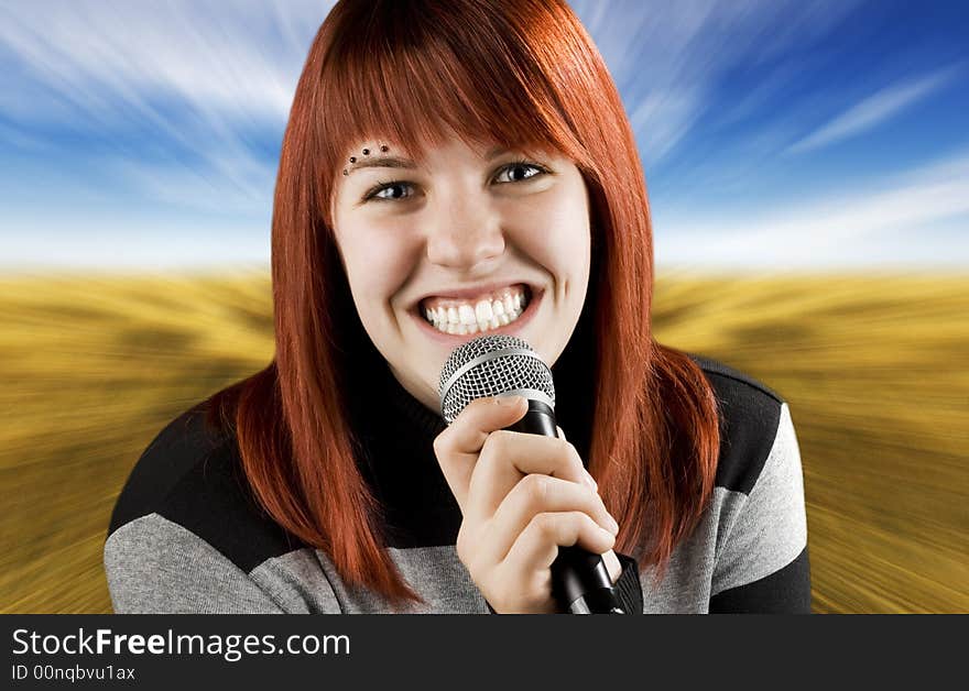 Joyful girl singing on the karaoke