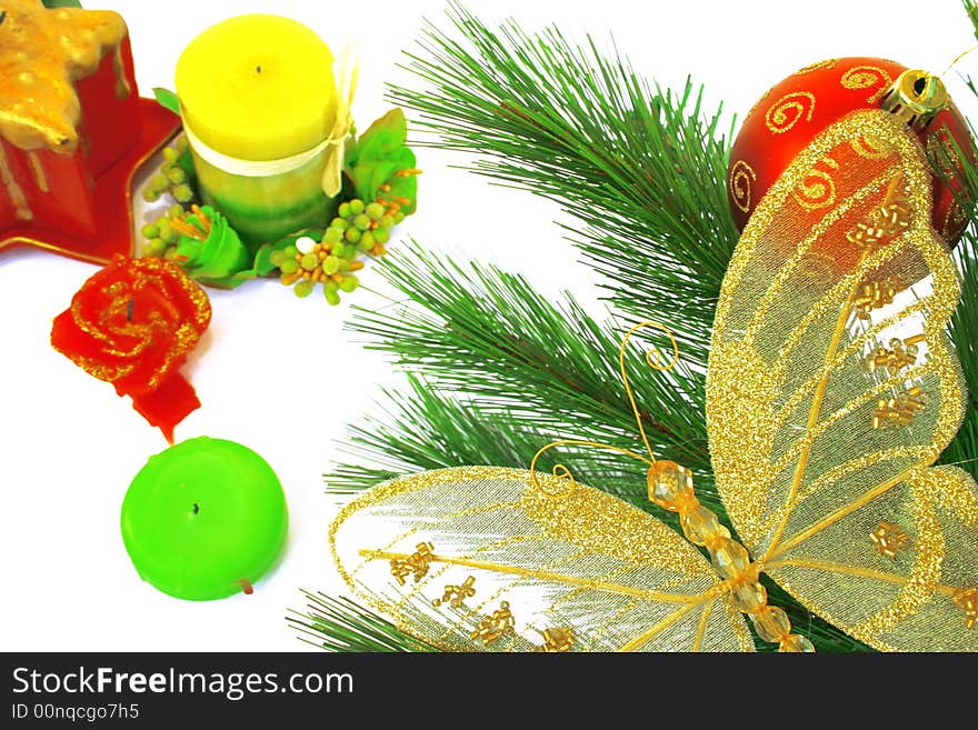 Christmas ornaments.Red ball,fir-tree,butterfly,candles.