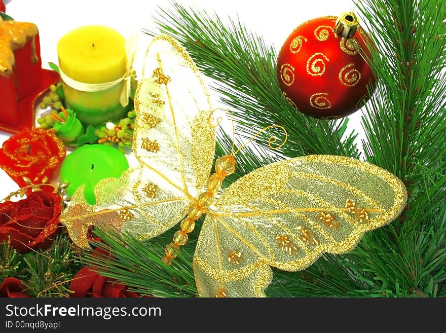 Christmas ornaments.Red ball,fir-tree,butterfly,candles.