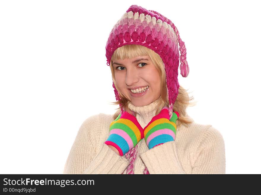 Smiling blond girl in cap and Multi-coloured gloves