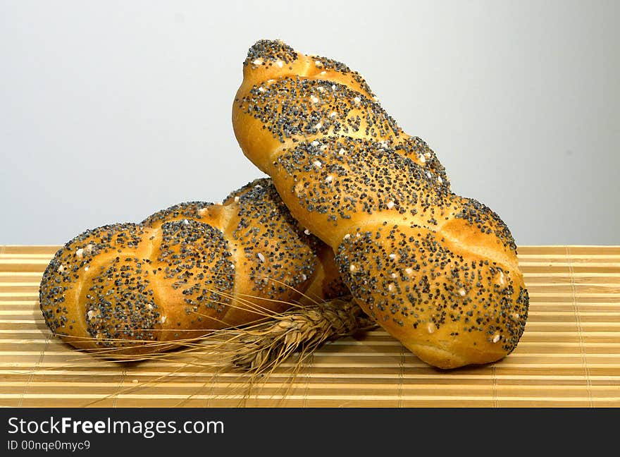 Different kind of bread on a wood background