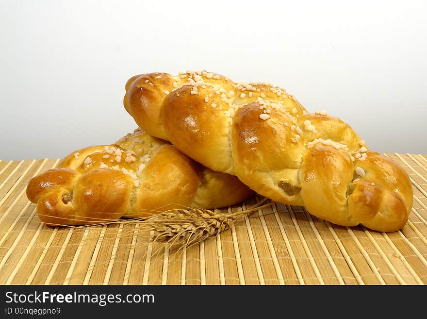 Different kind of bread on a wood background