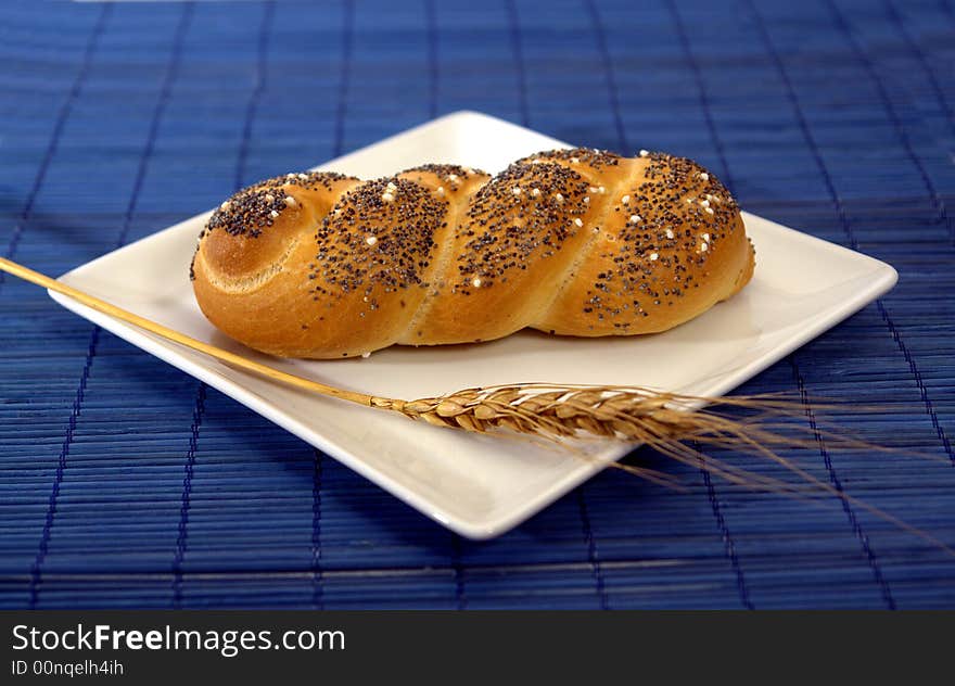 Different kind of bread on a wood background