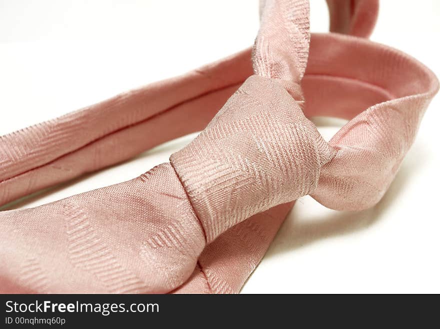 Pink tie on white