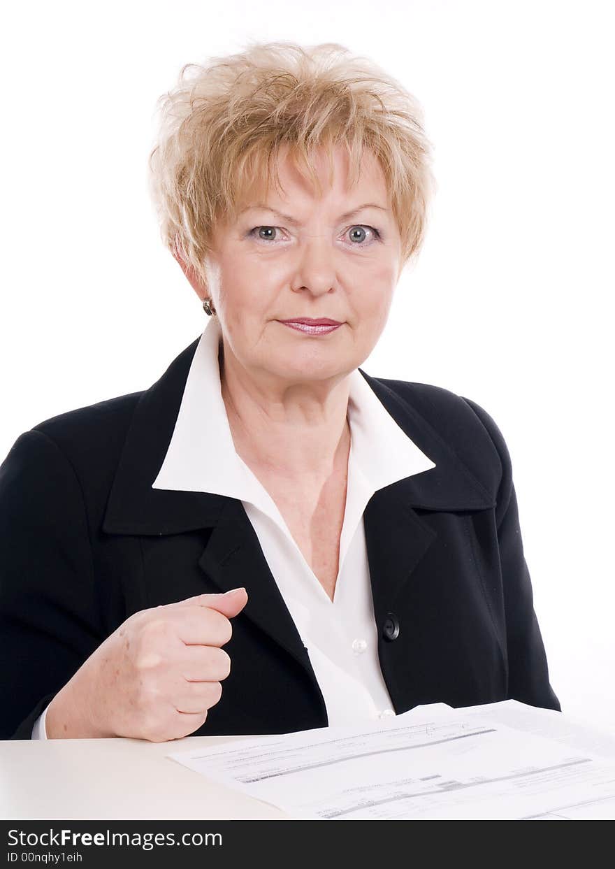 Dissatisfied  businesswoman beside the table