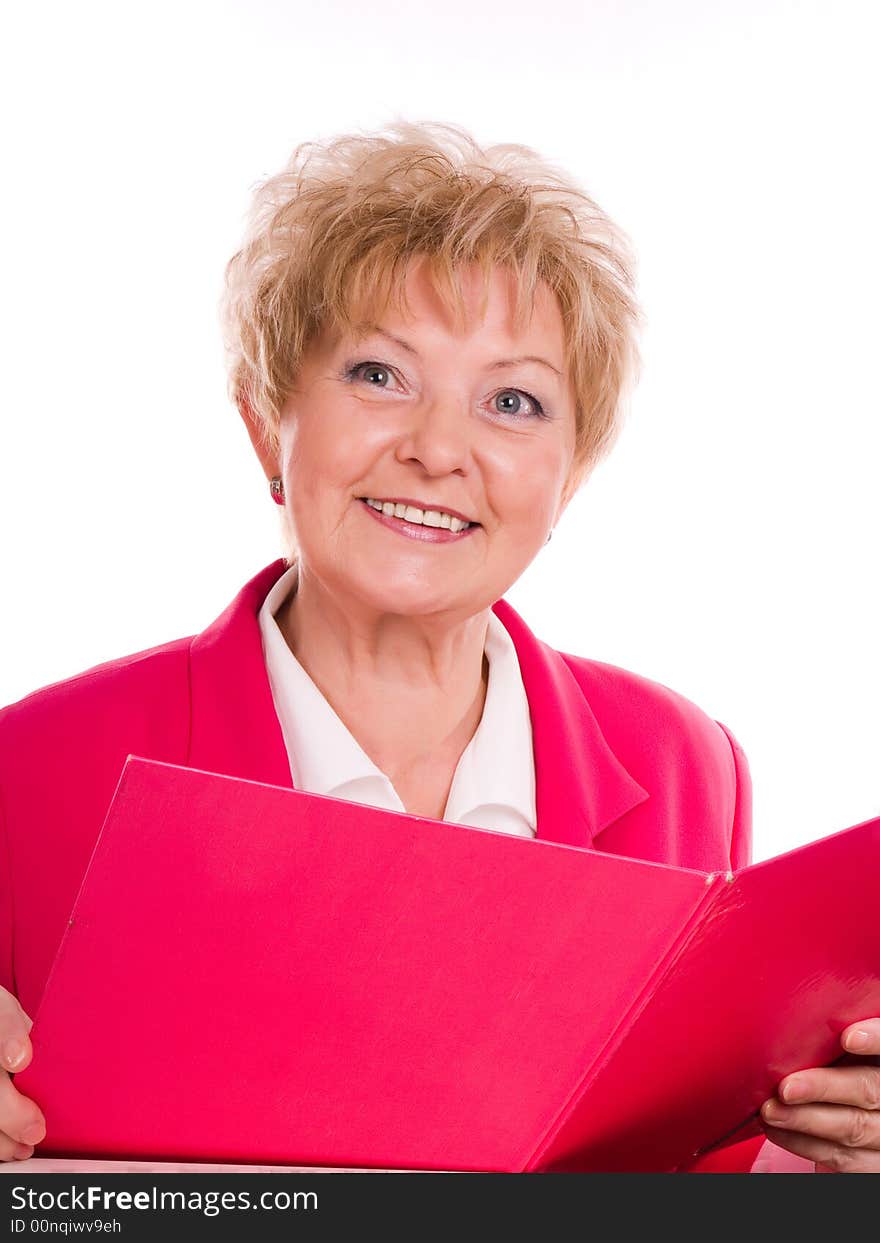 Buisinesswoman reading something in her pink folder. Buisinesswoman reading something in her pink folder