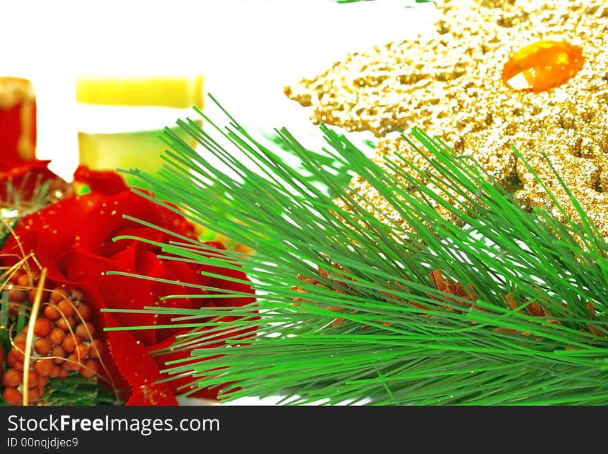 Christmas ornaments,yellow snow flake,fir-tree,candle,rose.