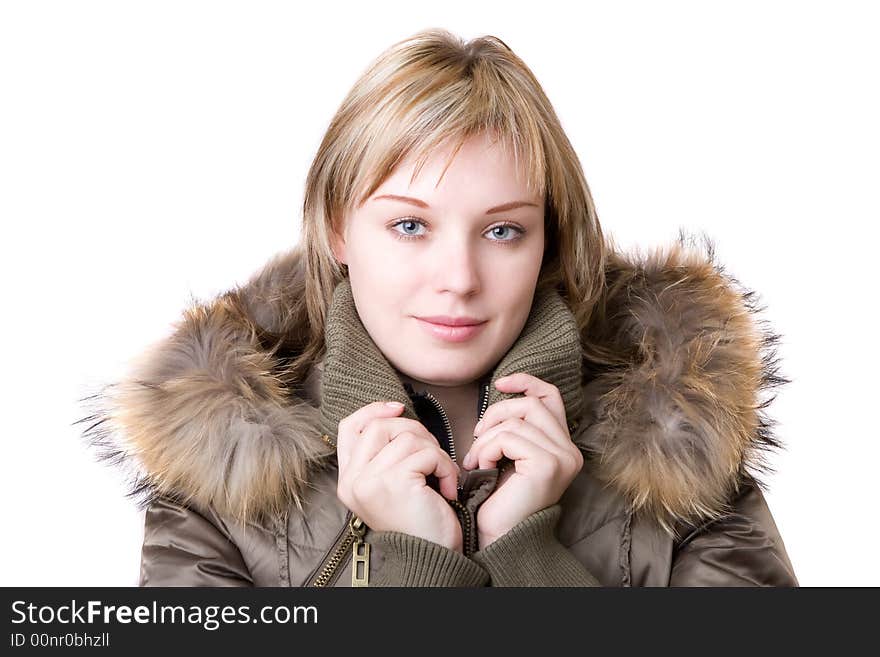 Young smiling girl in a jacket with a fur collar. Young smiling girl in a jacket with a fur collar