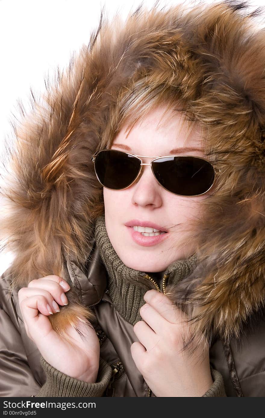 Young girl in a jacket with a fur collar. Young girl in a jacket with a fur collar