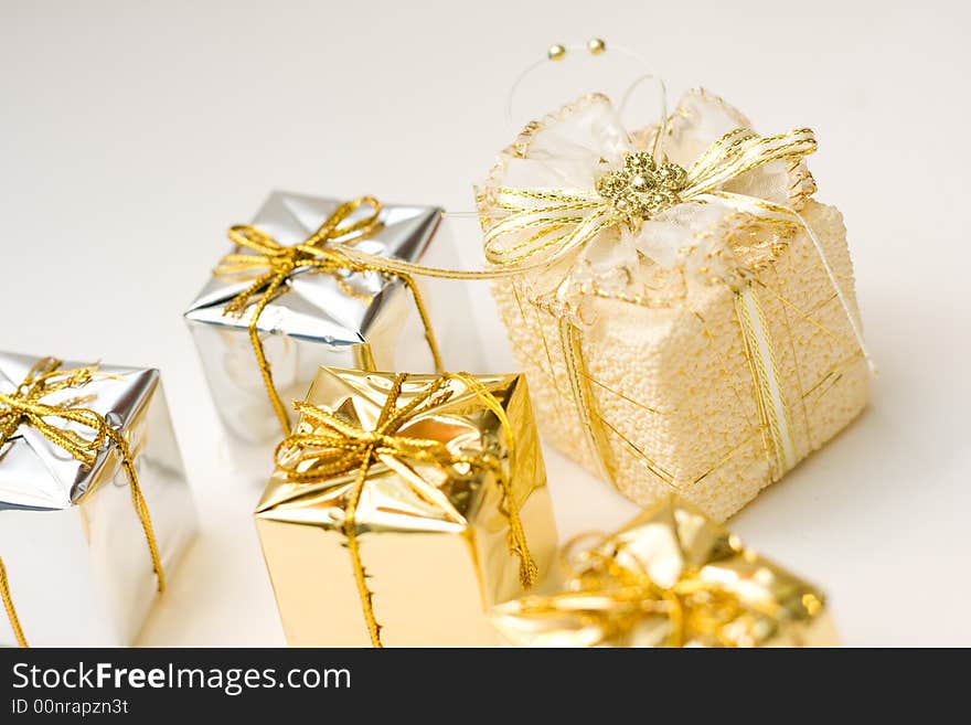 Small boxes with gifts, and the one is special, low DOF, copy space on left top. Small boxes with gifts, and the one is special, low DOF, copy space on left top